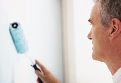 Man painting wall. Photographer: momentimages