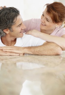 Man and woman talking. Photographer: momentimages