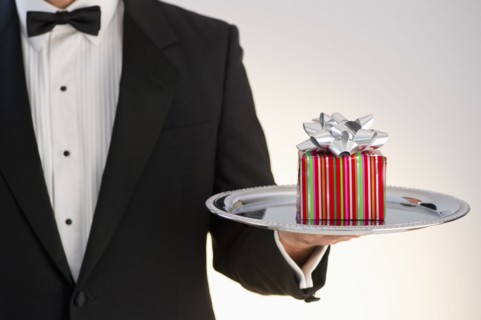 Butler holding gift.