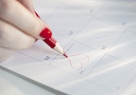 Drawing a heart on a calendar.