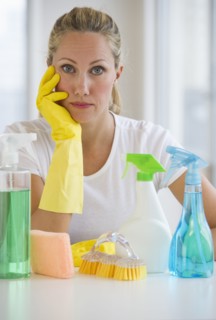 Woman and cleaning supplies.