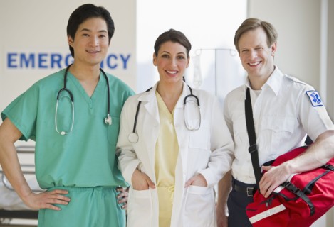 Healthcare workers in emergency room.