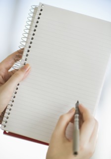 Lined paper in notebook.