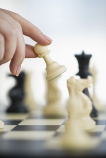 Playing game of chess.