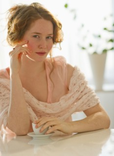 Beautiful woman drinking espresso.