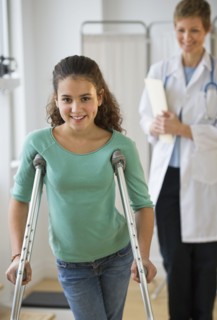 Patient walking on crutches.