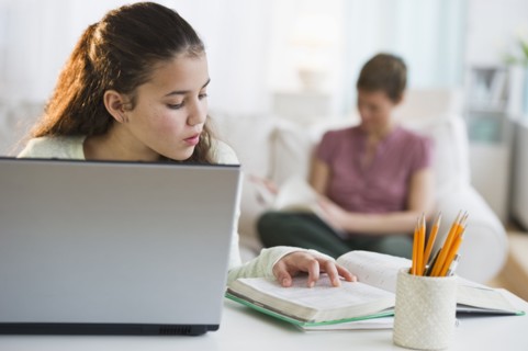 Young girl doing homework.