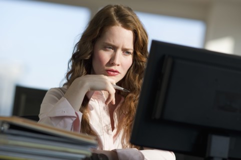 Woman working at computer.
