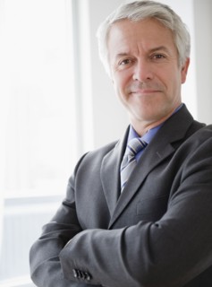 Confident businessman. Photographe : Jamie Grill