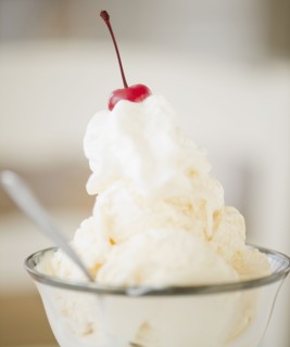 Ice cream with a cherry on top. Photographe : Jamie Grill