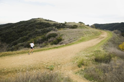Person running on trail.