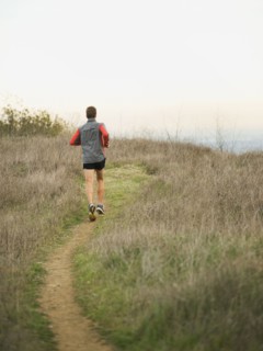 Person running on trail.