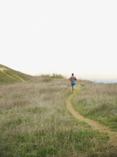 Person running on trail.