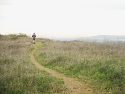 Person running on trail.