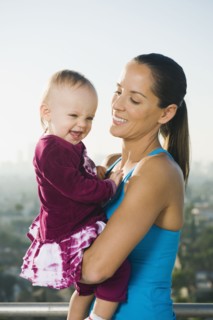 Woman holding toddler.