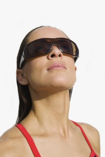 Woman wearing sunglasses.