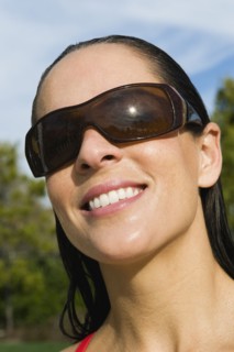 Woman wearing sunglasses.