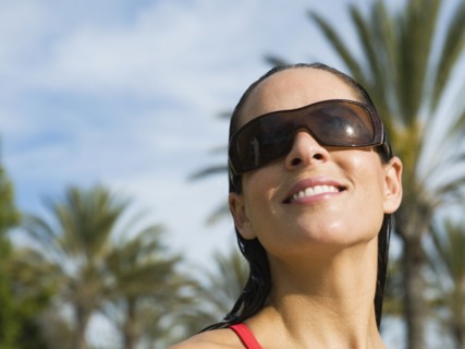 Woman wearing sunglasses.