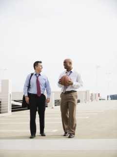 Businessman on their way to basketball game.