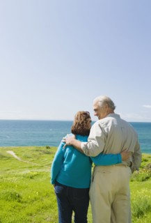 Couple looking at the ocean.