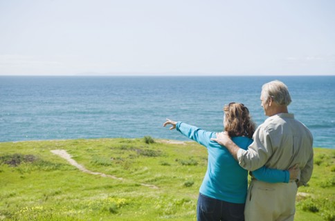 Couple looking at the ocean.