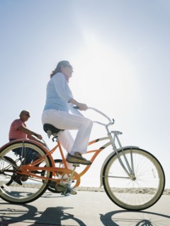 Couple riding bicycles.