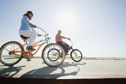 Couple riding bicycles.