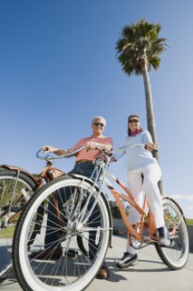 Couple riding bicycles.