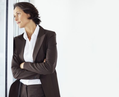 Contemplative businesswoman. Photographe : momentimages