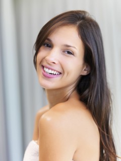 Woman wearing a towel. Photographe : momentimages