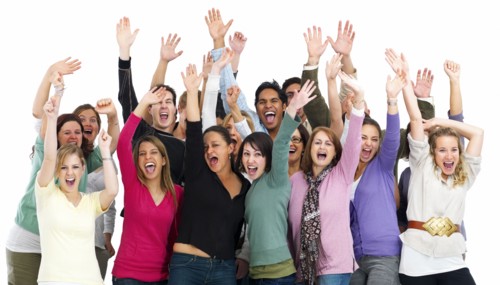 Group of people cheering. Photographe : momentimages