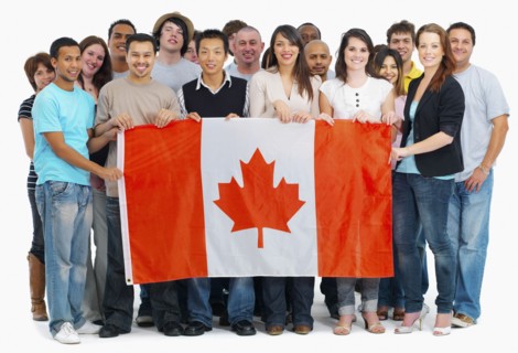 Group of people holding Canadian flag