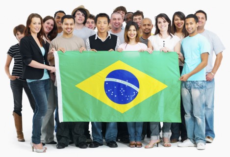 Group of people holding flag. Photographe : momentimages