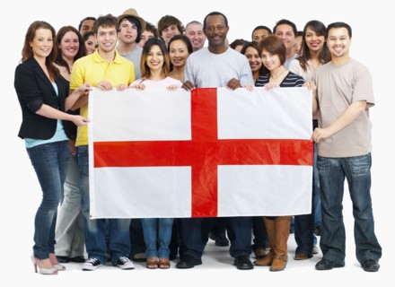 Group of people holding flag. Photographe : momentimages