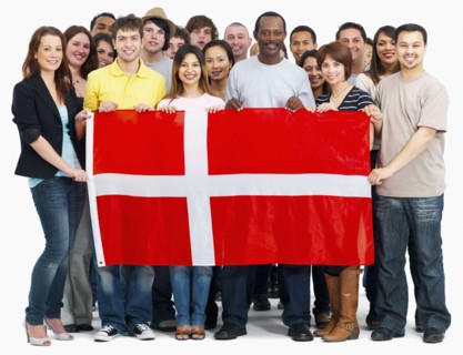 Group of people holding flag. Photographe : momentimages