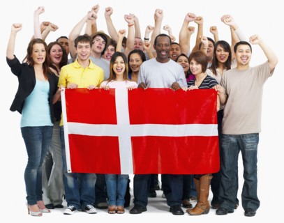 Group of people holding flag. Photographe : momentimages