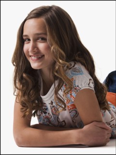 Portrait of a happy young girl. Photographe : Mike Kemp