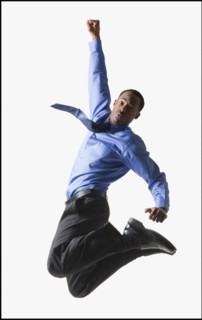 Businessman jumping. Photographe : Mike Kemp