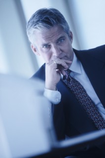 Serious businessman. Photographe : Rob Lewine