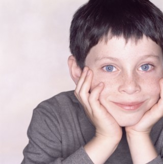 Portrait of a young boy. Photographe : Rob Lewine