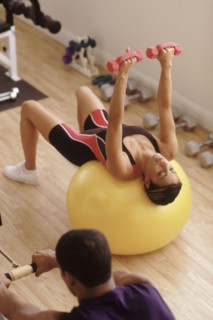 People working out in a gym. Photographe : Rob Lewine