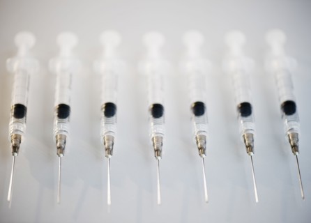 Row of medical syringes. Photo : Jamie Grill
