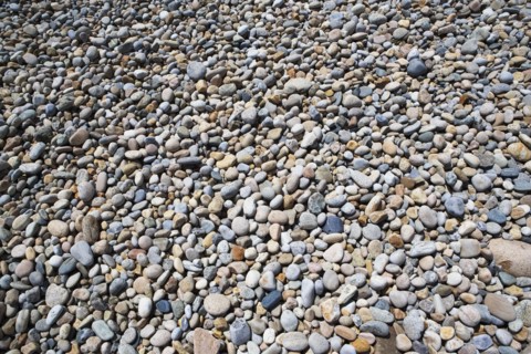 Rocks on the beach. Photo : fotog