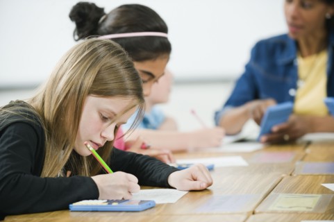 Students doing math work in classroom.