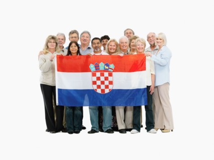 Group of people holding a Croatian flag. Photo : momentimages