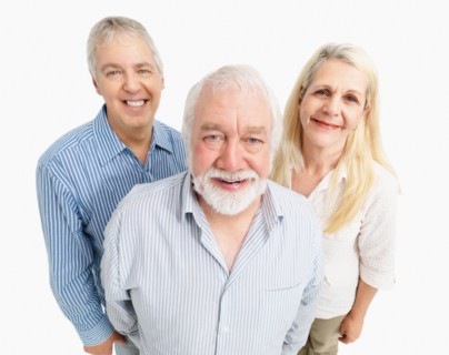Three smiling people. Photo : momentimages