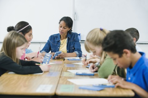 Students doing math work in classroom.