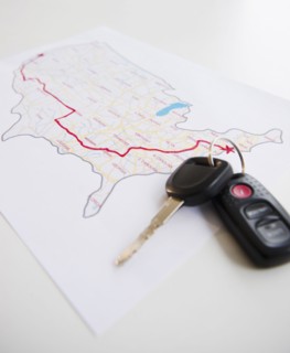 Car keys beside map of planned road trip. Photo : Jamie Grill