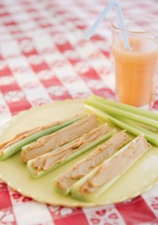 Celery and peanut butter on plate. Photo : Jamie Grill
