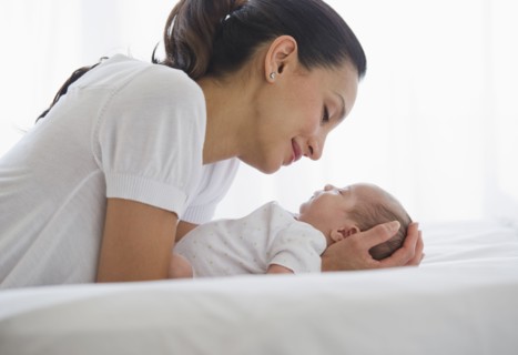 Mother sharing a tender moment with her baby.